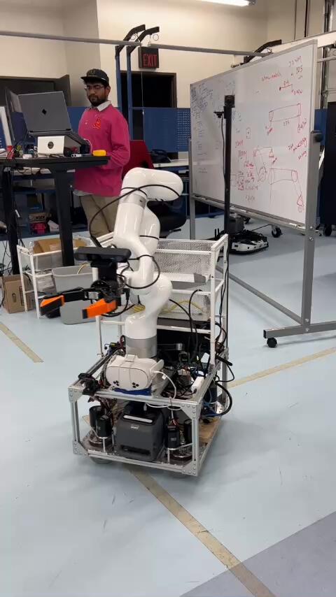 S-bot picking up a toy